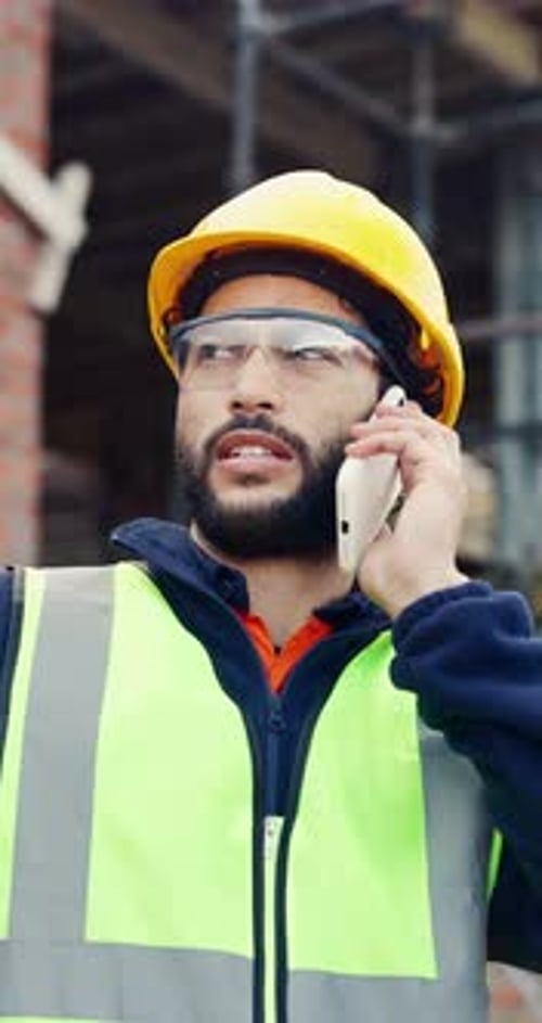 Talking, architect or man with phone call at construction site, schedule feedback
