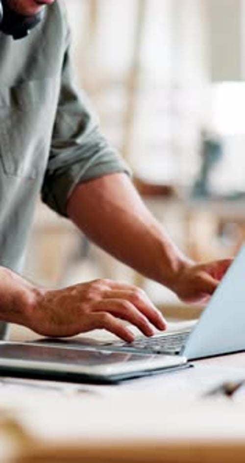Carpenter, laptop and man in factory, typing and email for online order, internet and manufacturing