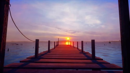 Peaceful Sunset Over Wooden Pier on Calm Lake