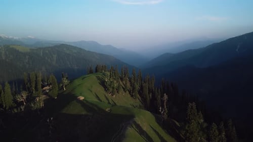 Tibetan Green Mountains in the Clouds During the Day Drone View