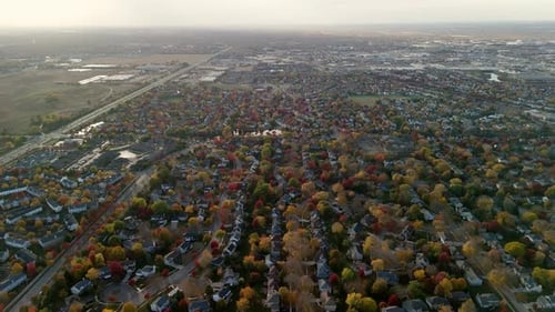 Overhead View of a Suburban Community in Fall Highlighting Seasonal Tree Colors