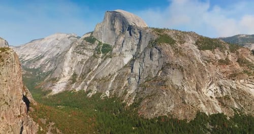 Great mountains of Yosemite, California, USA in the rays of bright sun.