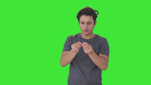 Indian man suffering from hair loss Green screen
