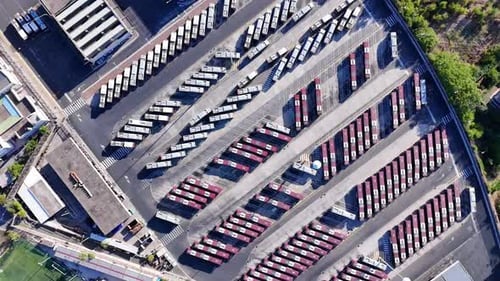 Aerial Top Down View of Bus Terminus is Designated Place Where Bus or Coach Starts or Ends Its