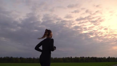Runner Athlete Running on Road