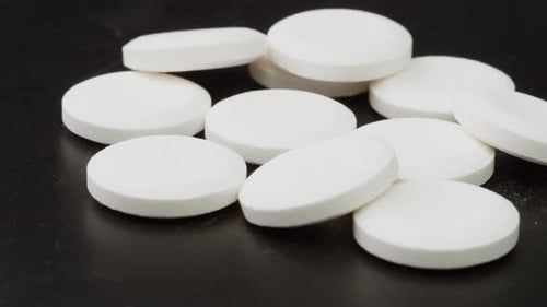 Pills and Vitamins Macro Close Up View of Womans Hands Holding Plenty of Different Drugs Painkillers