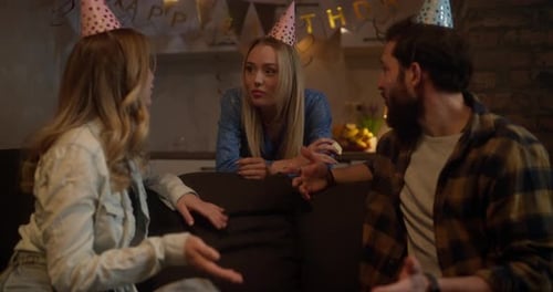 Friends Celebrating Birthday in Cozy Home Setting