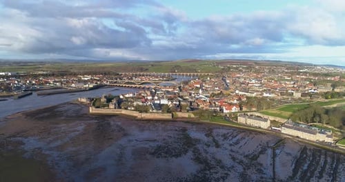 Aeria pull back shot heading out to sea away from the town of Berwick Upon Tweed
