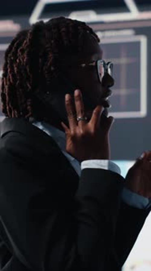 Vertical Video Close Up of Manager Doing Telephone Call with Shareholders