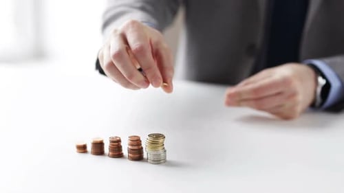 Business, People, Finances, Money Saving and Economy Concept - Close Up Of