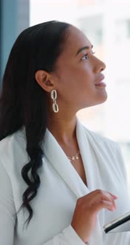 Thinking, woman and research with tablet in office, reading and checking property listing