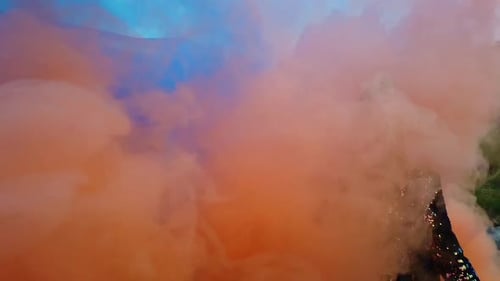 Woman with Smoke in Field