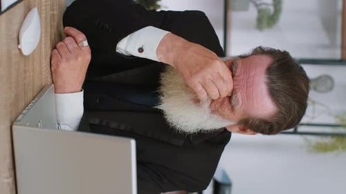 Tired Senior Business Man Suffering From Headache Problem Tension Migraine Stress at Home Office