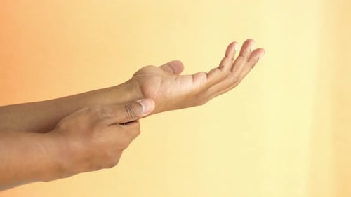 Man Suffering Pain in Hand Close Up