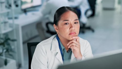 Focused Woman Working in a Modern Lab