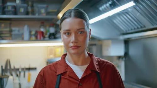Happy Woman Chef Smiling in Restaurant Kitchen Closeup Portrait Professional