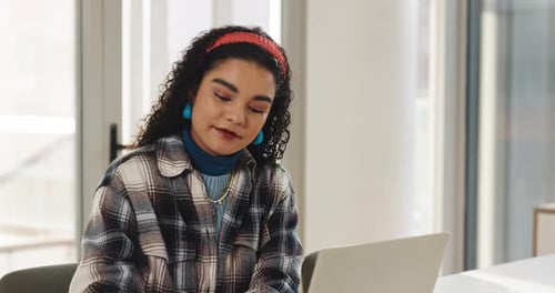 Laptop, smile and writing with business woman at desk in office for creative planning or strategy