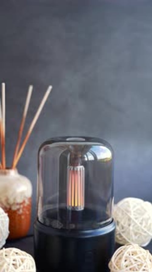 Close Up of Home Perfume Scent Air Humidifier with Light Aromatherapy Holistic Health Practices