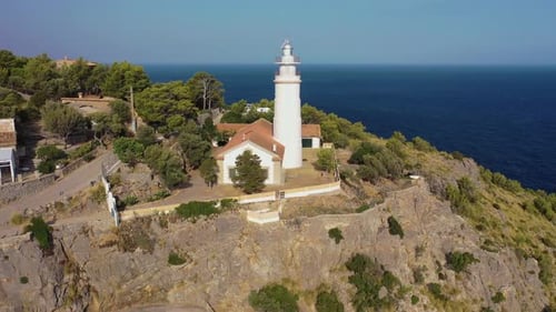 Aerial view of Far des Cap Gros, a lighthouse on the cliff, Mallorca, Spain.
