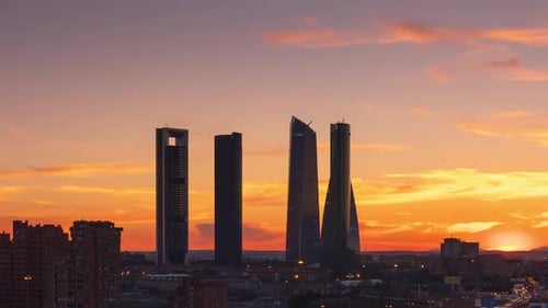 Timelapse of sunset with the 4 towers of Madrid as main subject. Day to night timelapse