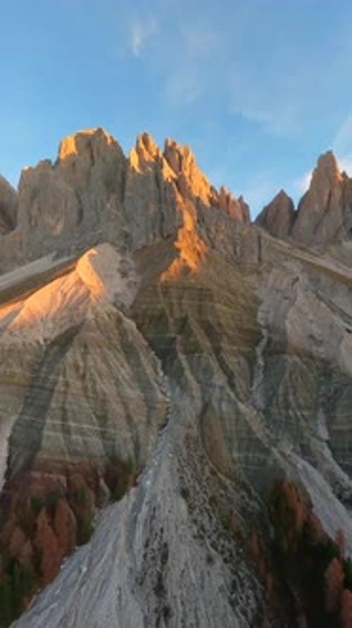 FPV Drone Flies Close to the Mountain Surface of Seceda Mountain Italy