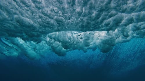 Crystal Clear Wave Breaks in the Ocean on the Maldivian Shore