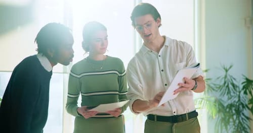 Creative, office and people with documents in meeting for company, brainstorming or planning