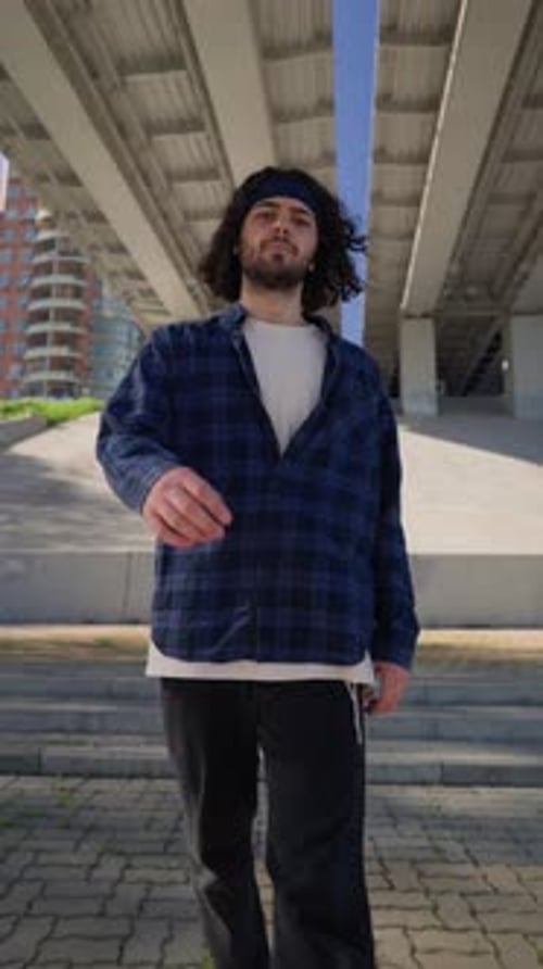 Vertical Video Stylish Male Street Dancer Dancing Hip Hop on Urban Background