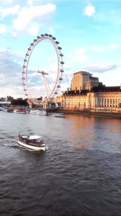 London Eye and River Thames with Tourist Boats in London