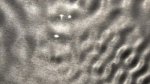 Abstract Water Ripples Creating Circular Patterns