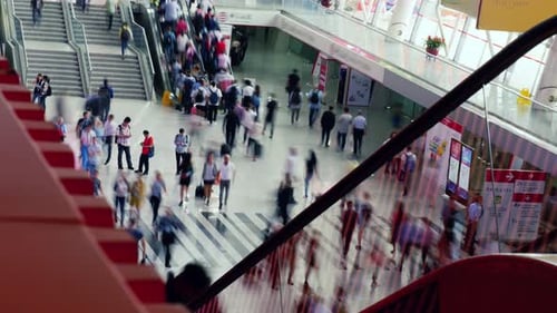 Busy shoppers and travelers moving through a modern mall in yiwu China