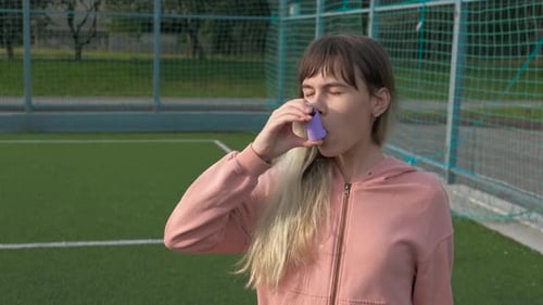 Une sportive se sent malade