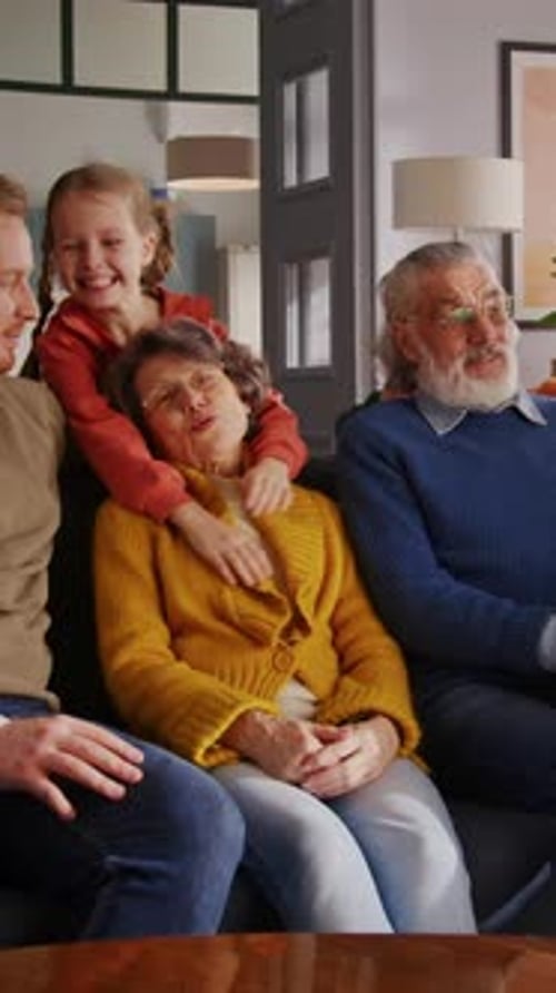 Family Enjoying Time Together on Couch at Home