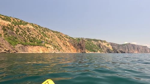 Sea Water Surface Background Low Angle View From Kayak Camera Flies Over the Clear Green Sea Water
