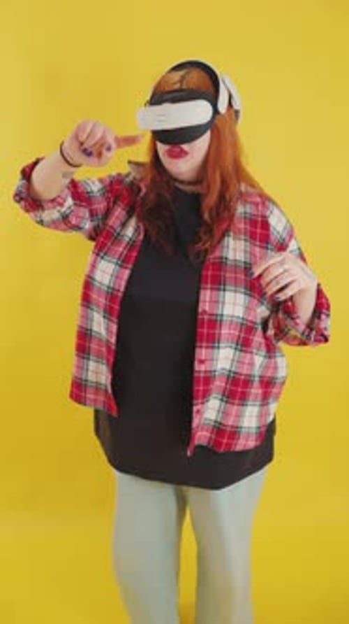 Woman Experiences Virtual Reality Technology on Yellow Background