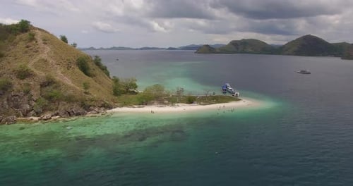 Small island in nature park Komodo Island Indonesia
