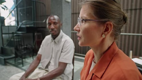 Diverse Group Discuss Ideas in Workplace