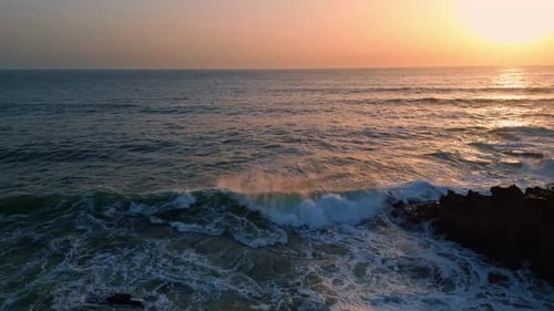 Stunning Aerial Foaming Ocean Crashing Cliff Sea Waves Breaking Rock Silhouette