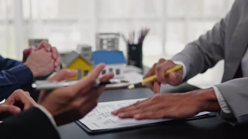 Businesspeople sell buy mortgage and signing agreement for apartment financial