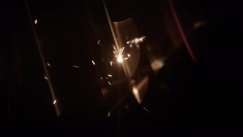 Blurry Lights Emitted By Burning Sparkler