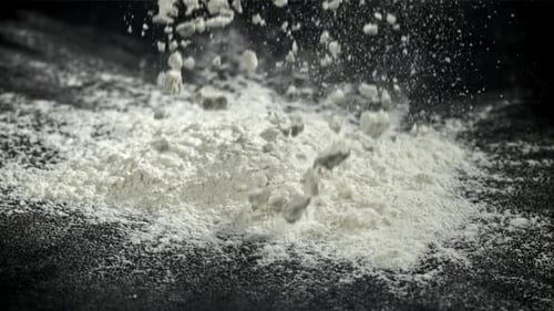 Flour Falls on the Kitchen Table Filmed on a Highspeed Camera at 1000 Fps