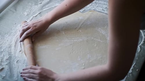 Making a Sweet Roll with Chocolate and Berries