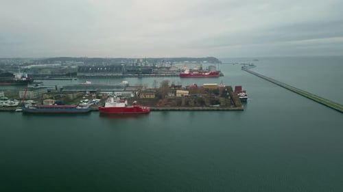 Aerial View of the Gdansk Port with Ships Docked in the Sea