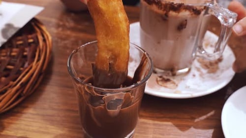 A Delicious Spread of Churros and Coffee Served at a Traditional Cafe in Ronda Spain Showcasing