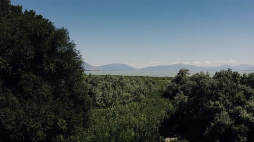 Drone shot approaching Utah Lake, in Lehi, Utah.