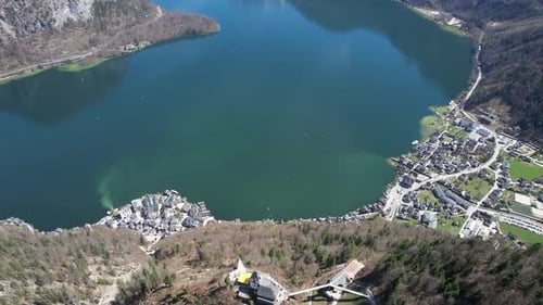 Aerial video of village, snowy mountains and lakes in Tyrol, Austrian Alps, Austria