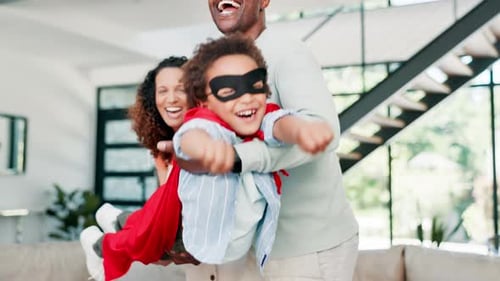 Father Spinning Child as Mother Watches On