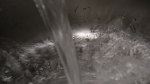 Pouring Water Into the Pot