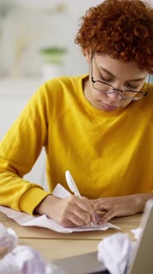 Young Student Girl Writing Letter on Paper Vertical Portrait of African American Woman Sitting at
