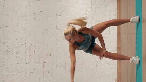 Healthcare and Wellbeing Advertisement Concept Woman Fitness Coach Doing Half Knee Bend Stretch